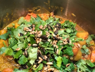 Roasted seeds and fresh coriander to serve
